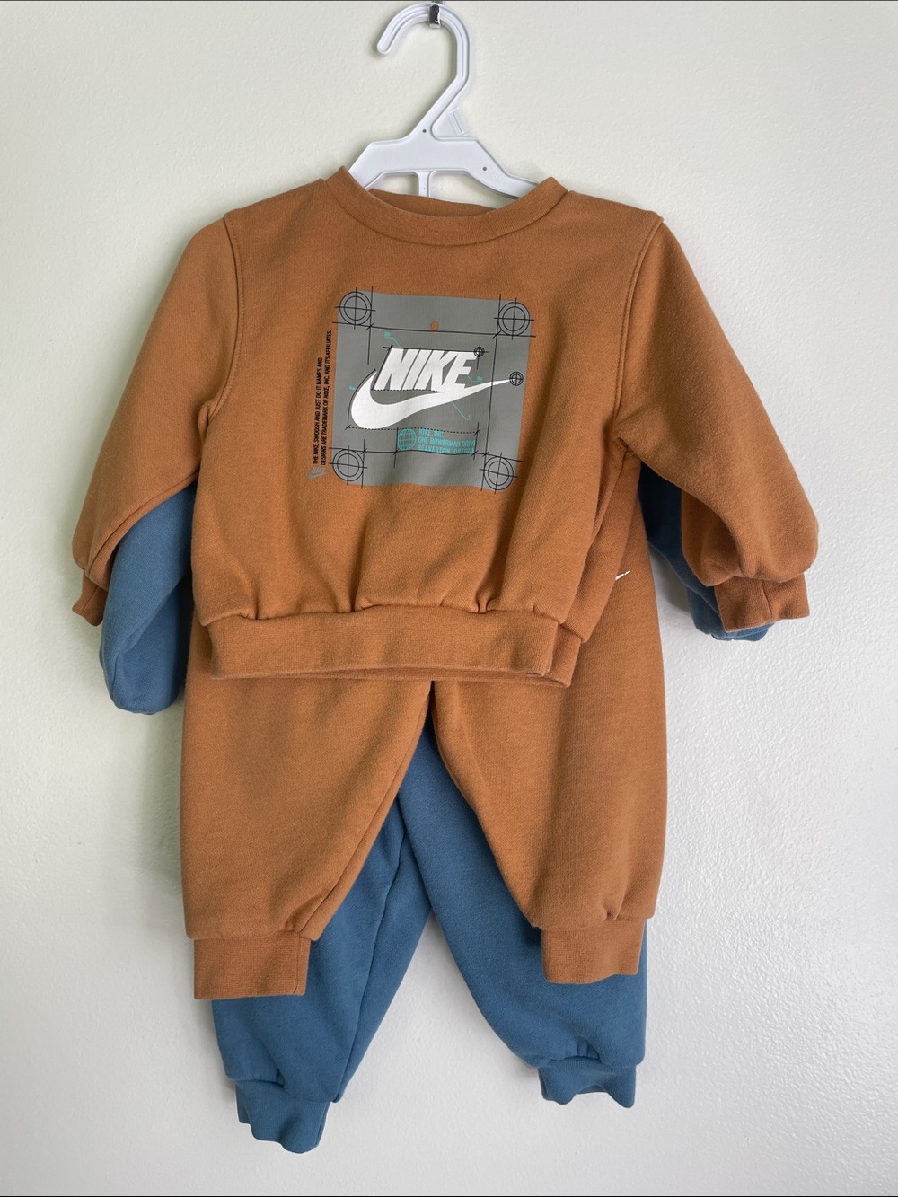 Nike Kids sweatsuits (2). Camel color and Blue- would sell separate
